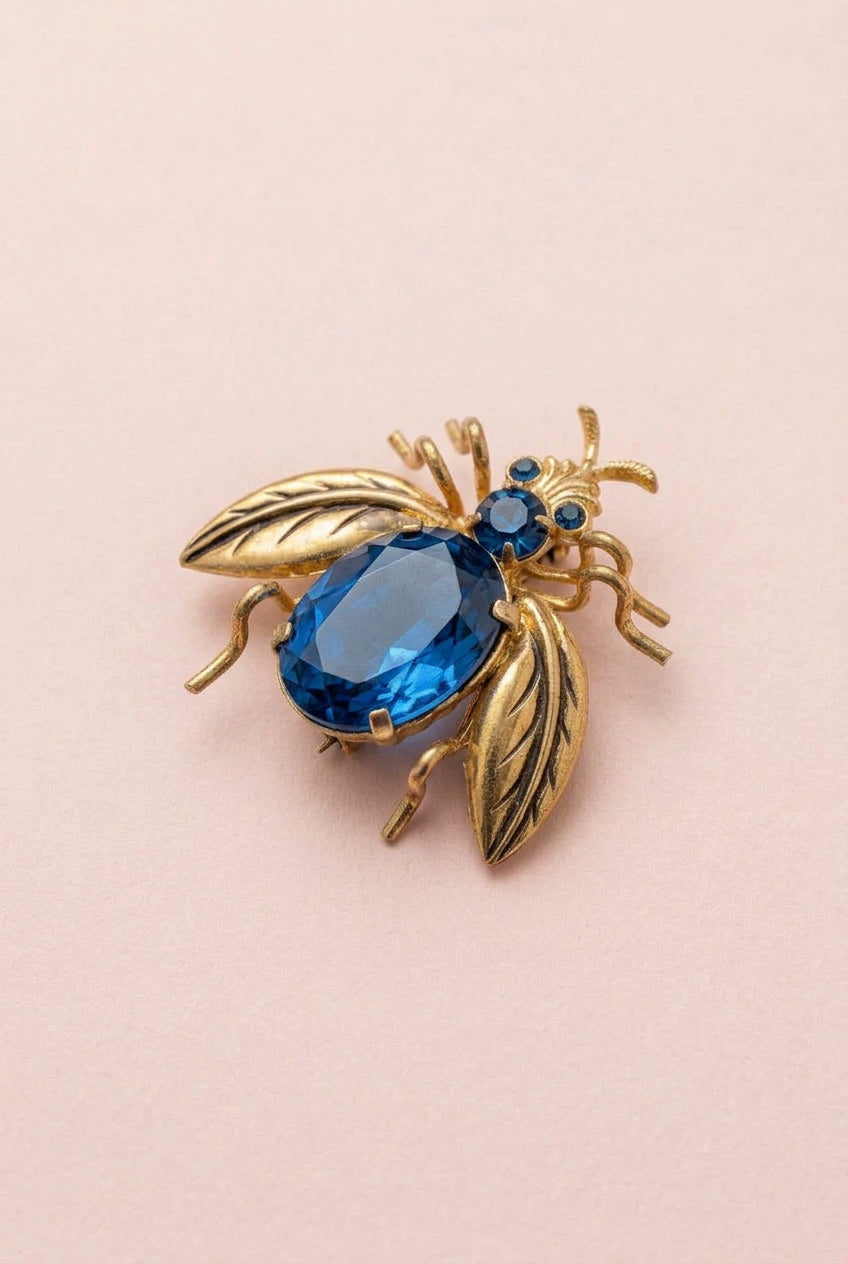 Striking Art Deco stamped Czech glass bug pin