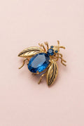 Striking Art Deco stamped Czech glass bug pin